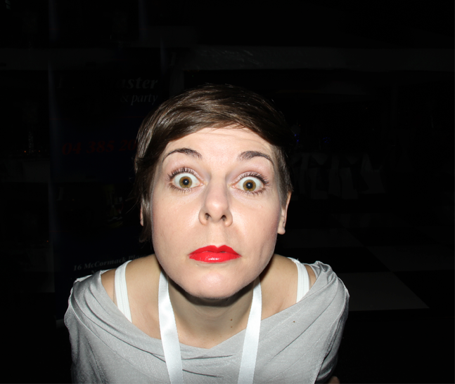 A Wellington woman poses in front of the selfie photobooth
